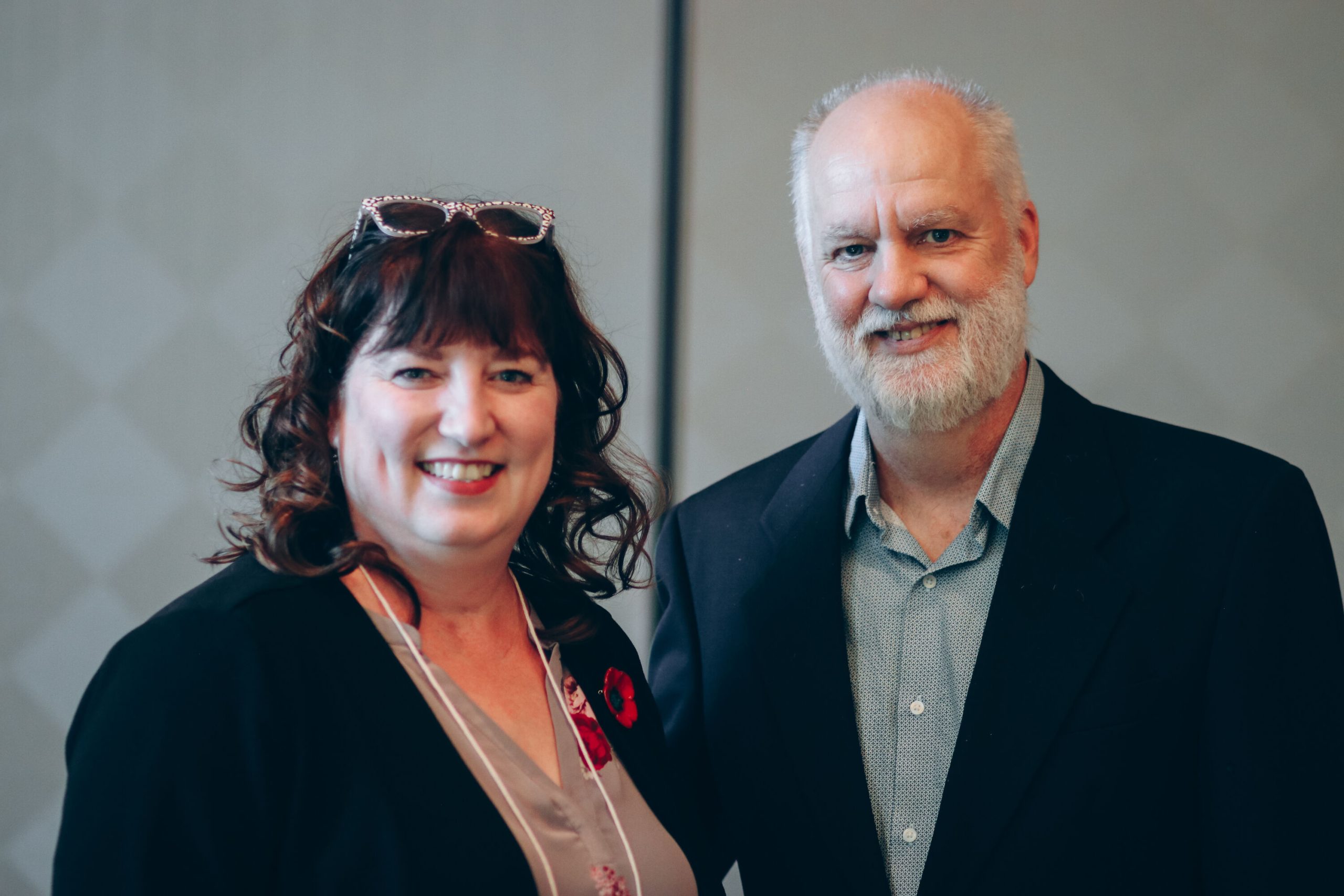 A photo of Parachute President and CEO Pamela Fuselli with keynote speaker, Globe and Mail columnist André Picard