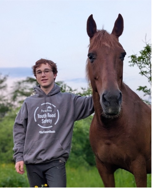 Photo of Nathanael Buschhaus with horse