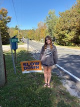 Photo of Harper Bracken in grey Youth Road Safety hoodie