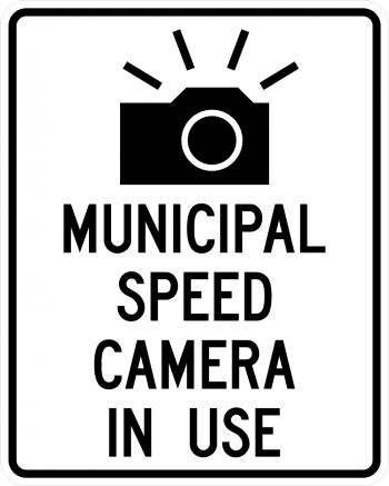 Image of sign: "Municipal speed camera in use"